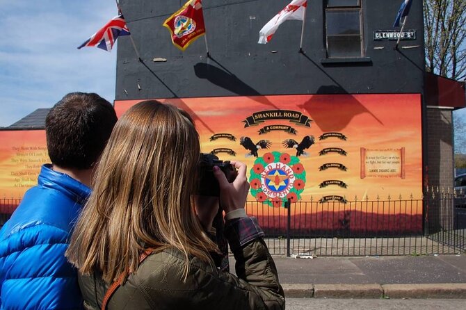 2 Hours Republican & Loyalist Mural Black Taxi Tour from Belfast - Divis Street International Mural Wall: where the city’s argument shows on brick