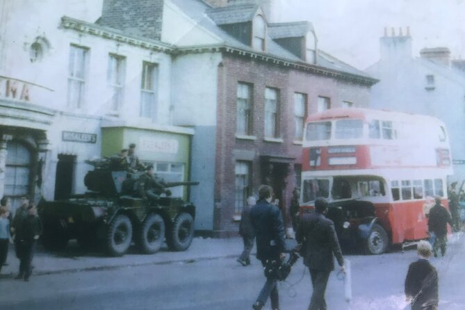 Award Winning Express 2 Hours Belfast Black Taxi/Cab tours - Divis Street international mural wall: over 40 murals and global connections