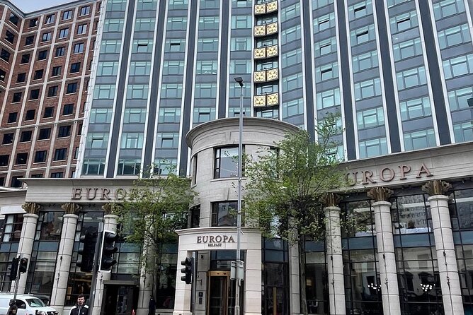 Belfast City Walking Tour - Wee Walks Big Talks - Europa Hotel and Great Victoria Street: historic facades and harder memories