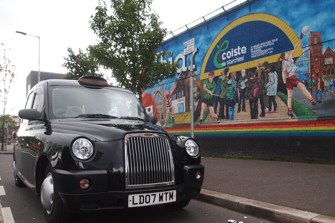 Black Taxi Mural "Tour Like A Local" - Private black taxi over crowded buses in Belfast