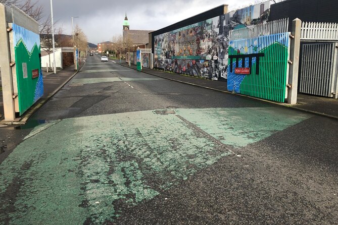 Black Taxi Tour of Belfast - Politics, Murals peace walls Tour - Bombay Street Memorial Garden: A Stop That Slows Everything Down