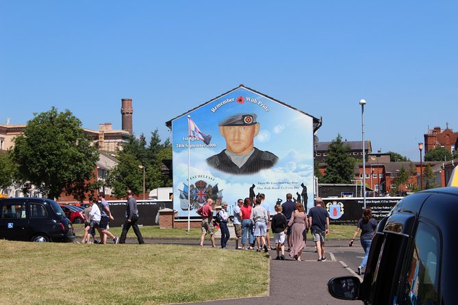 Famous 1.5 hour Belfast Murals Tour - Stop 2: International Mural Wall on Divis Street, the stories behind the symbols