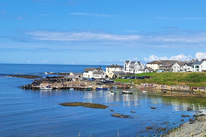 Five Star Giant's Causeway & Belfast Luxury Private Excursion. - Dunluce Castle: cliffside ruins that feel dramatic even in bad weather