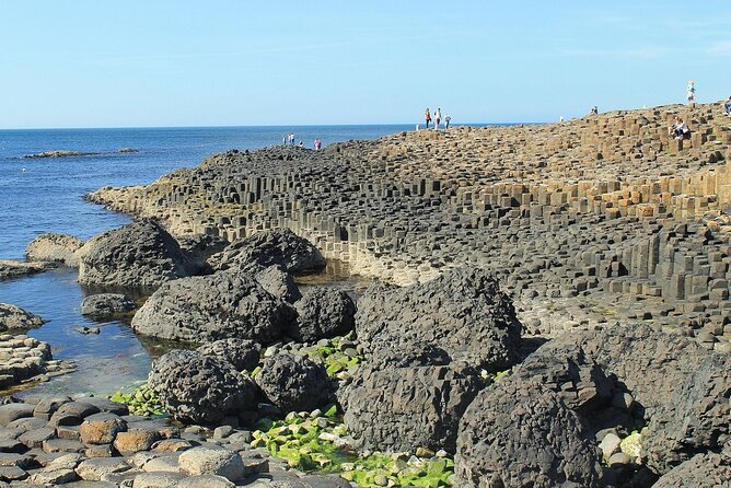 Full-Day Private Tour of Giants Causeway with Pick Up - Carrick-a-Rede rope bridge: 30 meters up, and crossing back is part of it