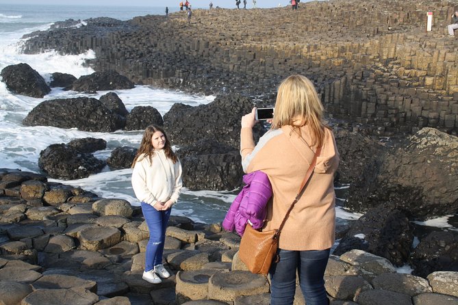 Giant's Causeway Day Tour and Belfast City Tour 1 Day Pass - Dunluce Castle: a fast viewpoint with castle vibes