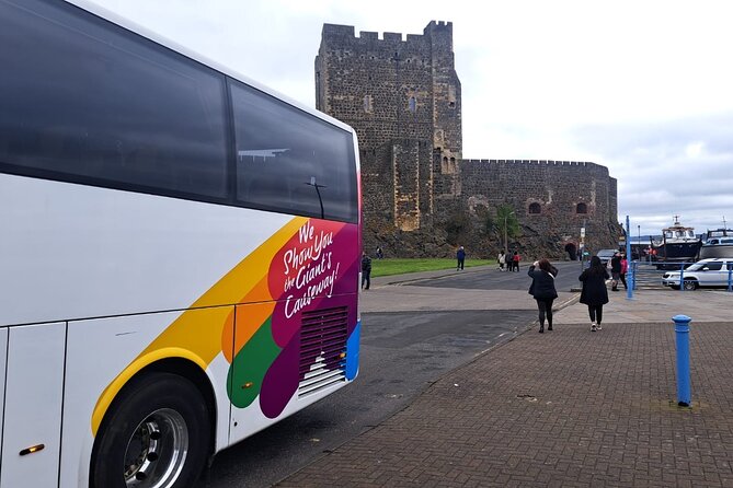 Giants Causeway & Castles Tour from Belfast: Guided tour - Carrickfergus Castle: Start strong with a fortress that actually feels lived-in
