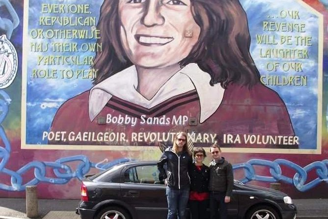 Official World Famous Belfast Taxi Tour ™ - Falls Road context: Bobby Sands murals and St Peter’s Cathedral area
