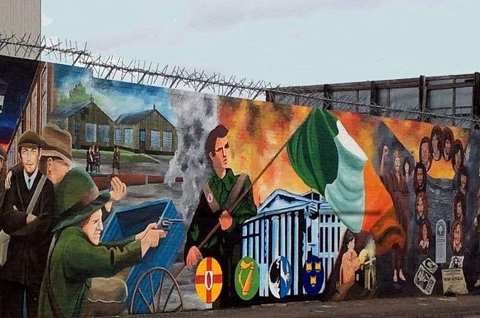 The Troubles Tour- Two Stories, One Journey - The Clonard Martyrs Garden, closing gates, and the Peace Wall you sign