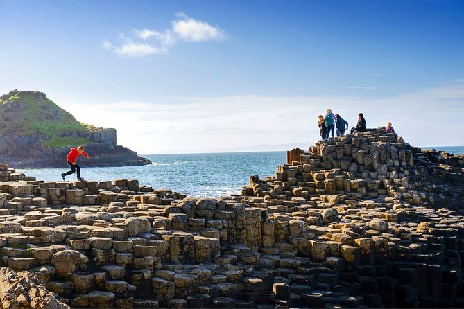 Titanic Experience and Giant's Causeway tour from Belfast - Dunluce Castle ruins: a 5-minute Greyjoy photo break you can actually use